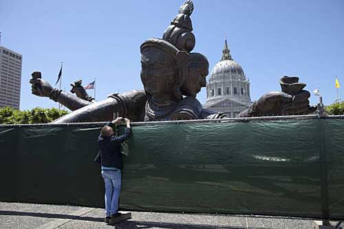 Three Heads Six Arms sculpture by Zhang Huan