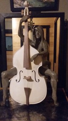 woman with cello by Edward Kitt - search and link Sculpture with SculptSite.com