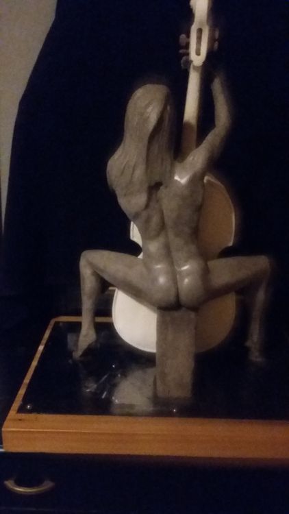 woman with cello by Edward Kitt - search and link Sculpture with SculptSite.com