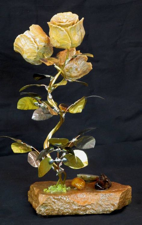 A Triple Butterscotch Onyx Stone Flower Sculpture by John Foster - search and link Sculpture with SculptSite.com